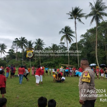 Pengamanan Bhabinkamtibmas Warnai Kegiatan Lomba HUT RI ke-79 di Dusun Airlou